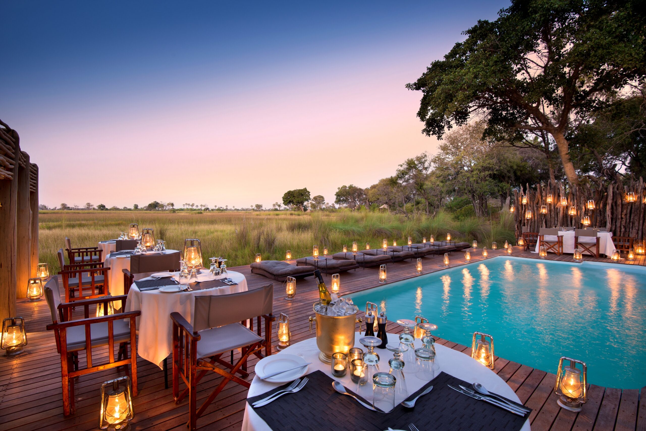 Botswana-Nxabega-Okavango-Tented-Camp-Guest-Area-Deck-dinner-at-the-pool
